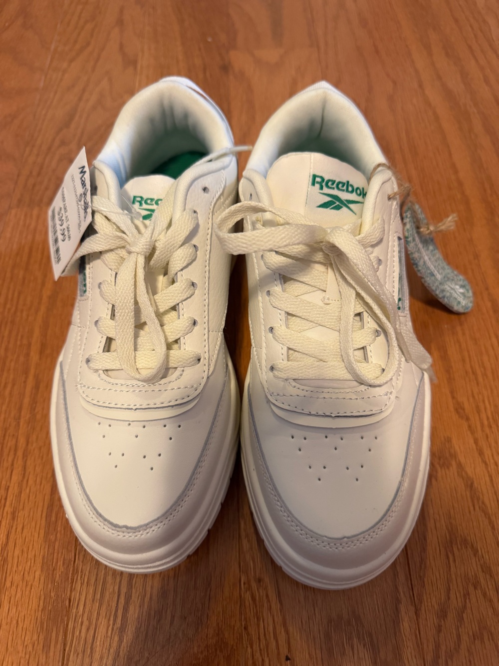Women’s Reebok White Leather Sneakers with Green Logo
